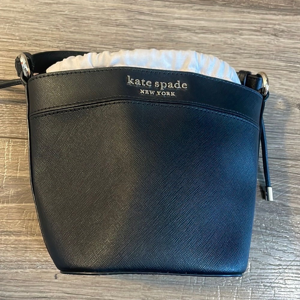 Kate Spade small bucket bag with extra adjustable strap.